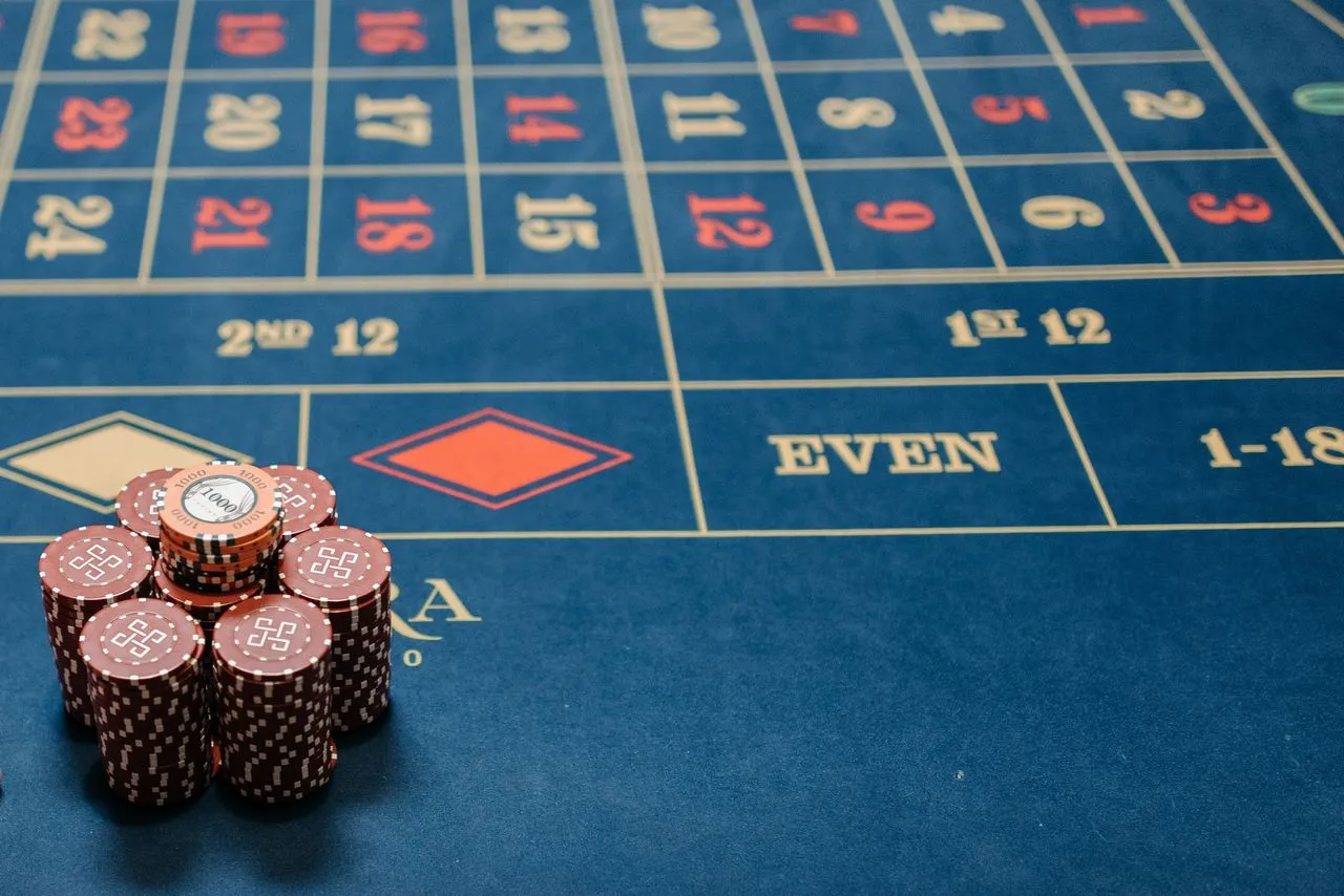 Poker-style gaming table with chips ready for an event